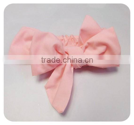 Wholesale Lovely Pom Pom Headband In Plain Pale Pink