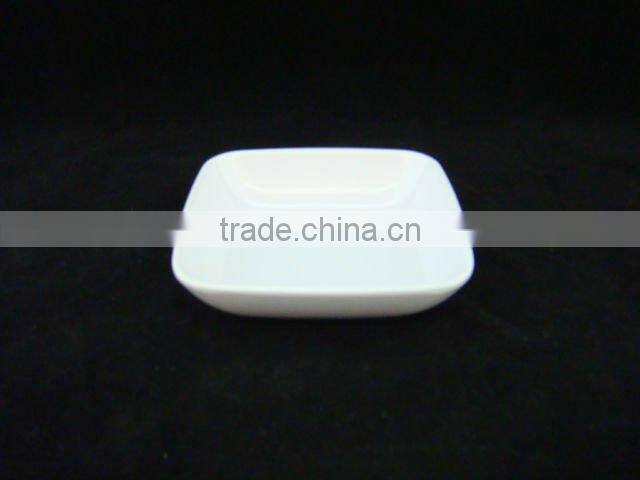 white round melamine sauce dish