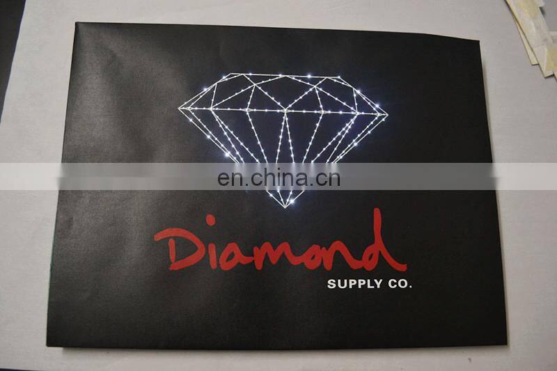 Customized your style lighting up presenting musical Christmas paper bag for gift