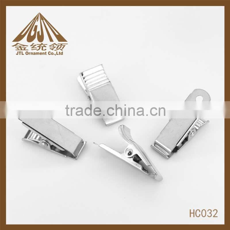 Metal clip with 2 holes