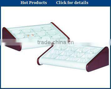 white stackable ring display tray in jewelry packing