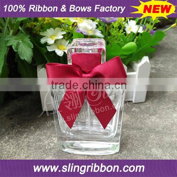 Satin & Lurex Ribbon Bow On Perfume Bottle