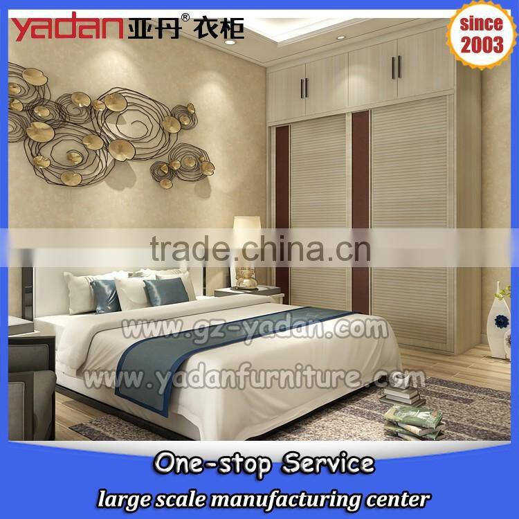 Light color bedroom closet design sliding door wardrobe and bed