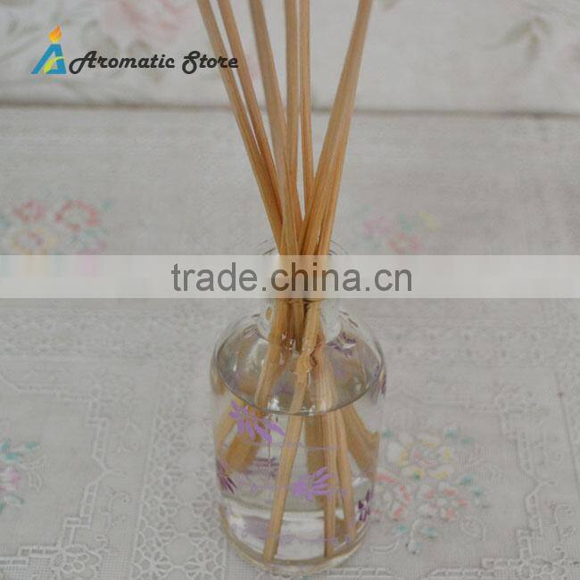 aroma source essential oils with reed sticks in glass bottle