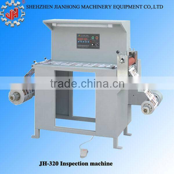 Roll to roll adhesive paper sticker label inspection machine