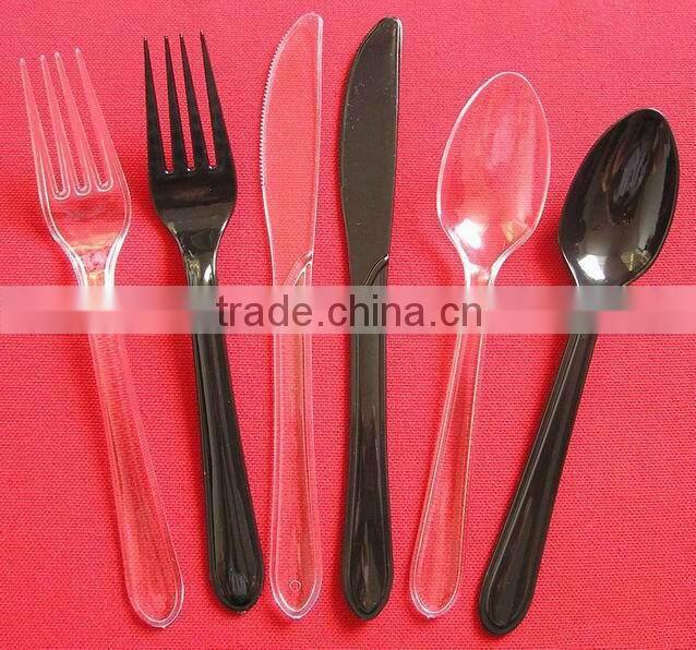 single-use polystyrene printed plastic cutlery (forks packet)