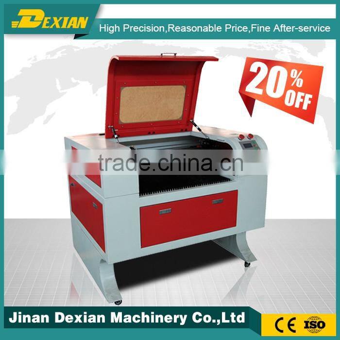 Mini portable co2 laser engraving machine price , cheap laser cutting machine for metal paper wood acrylic