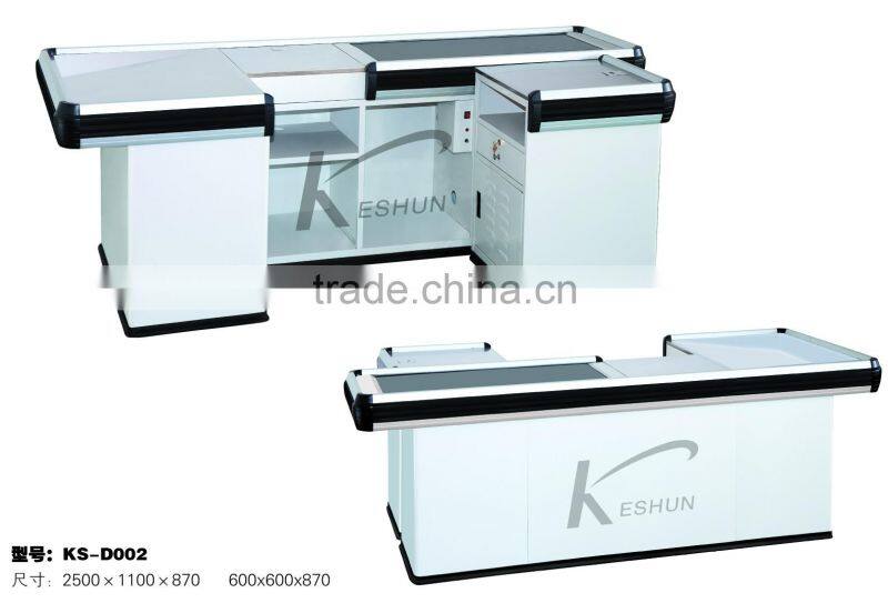 cash checkout counter with conveyor belt