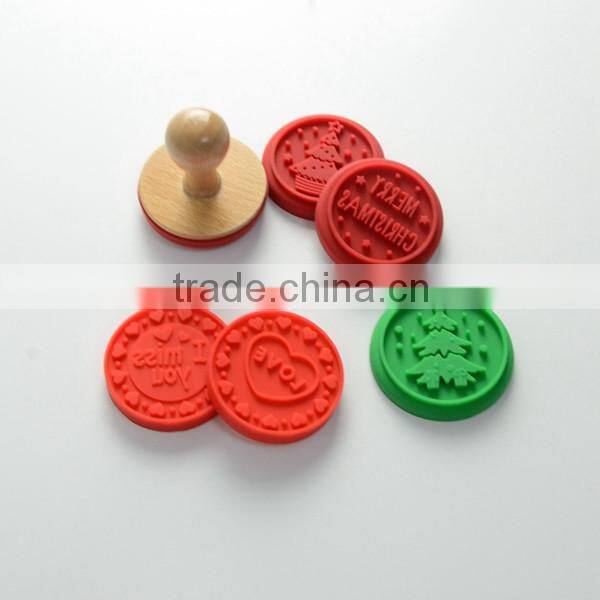 Silicone stamp cake tool with wooden handle