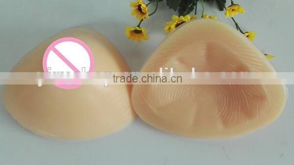 triangle shape hot selling fake sexy silicone breast falsies for male cross dressing or female breast enhancements or prosthesis