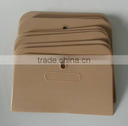 plastic putty scraper