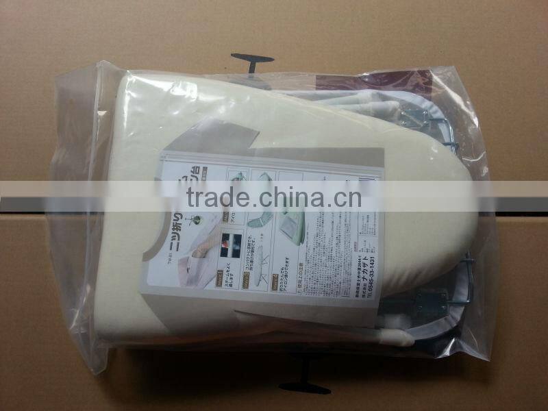 folding ironing board and ironing tabel in cupboard