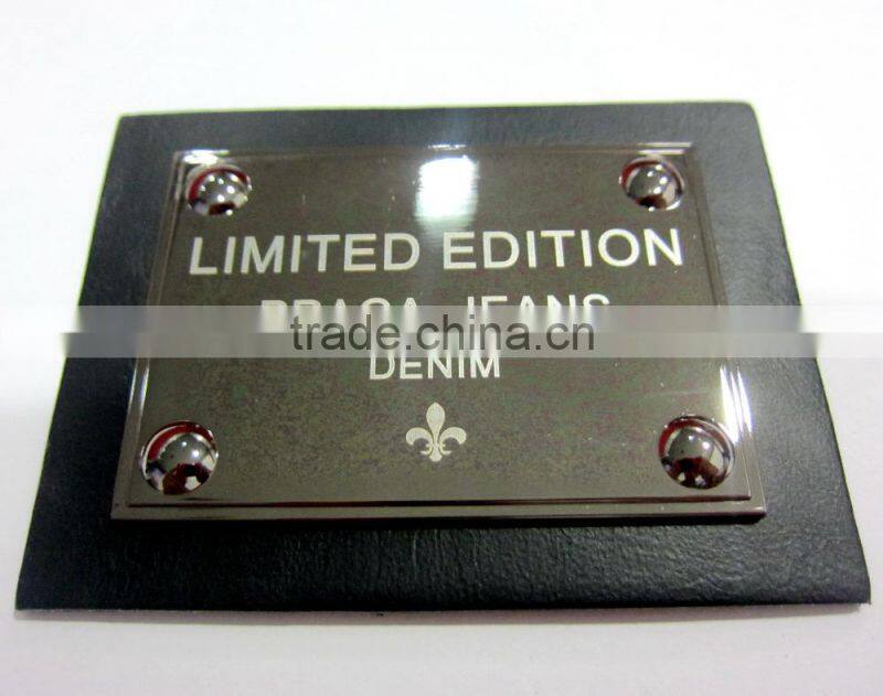 Embossed logo leather label for jeans
