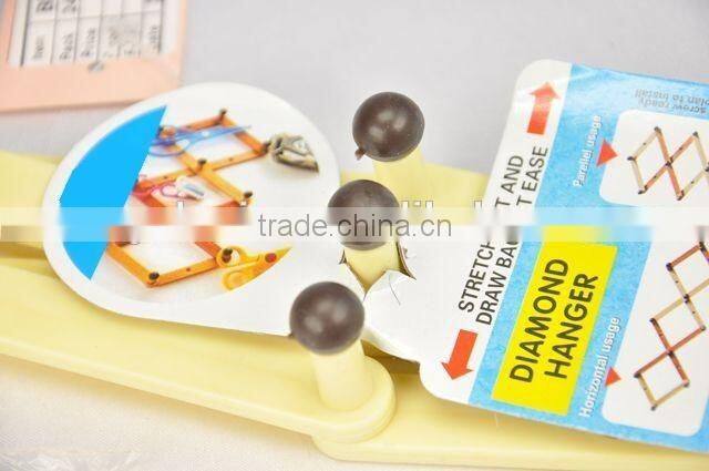 Retractable plastic diamond hook