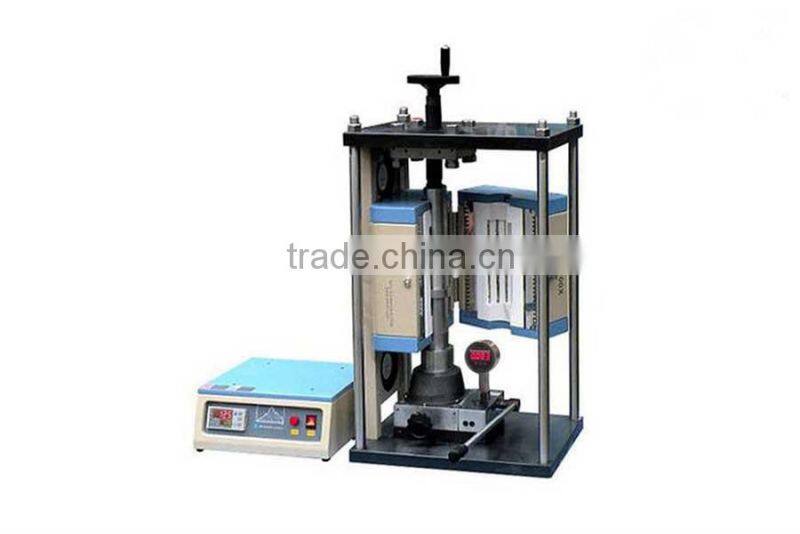 Vacuum heated pressing furnace for making dense compound materials