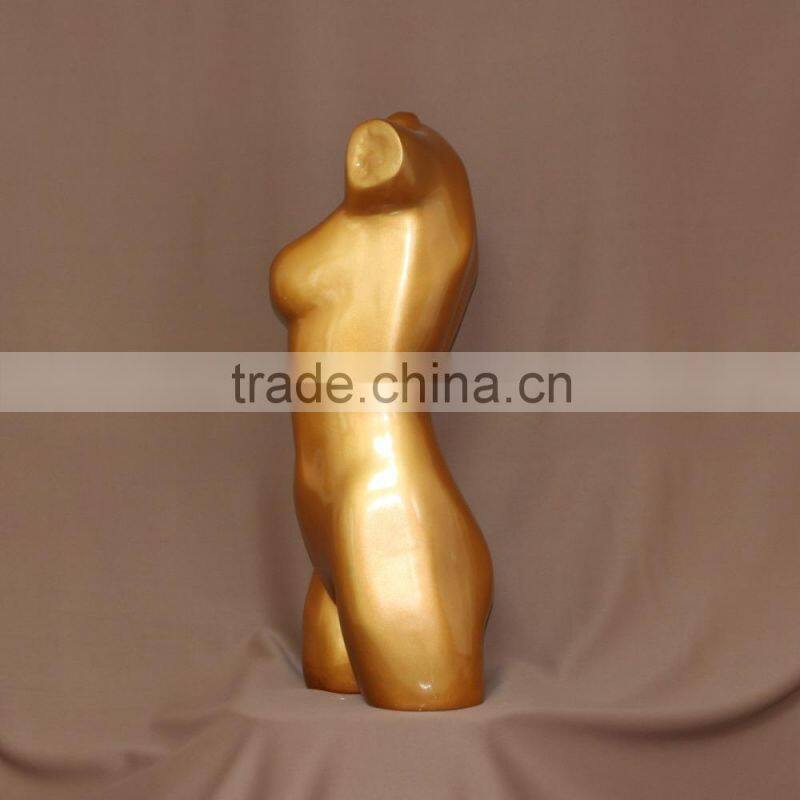 Bright gold upper-body female mannequin