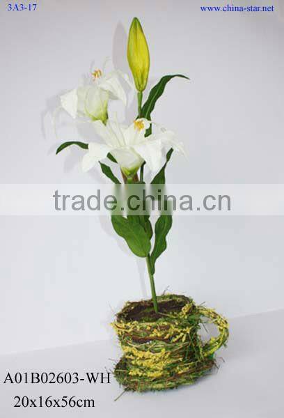 artificial lily with glass pot
