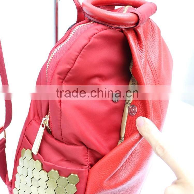 The new red embossed leather casual backpack, Wemen handbags