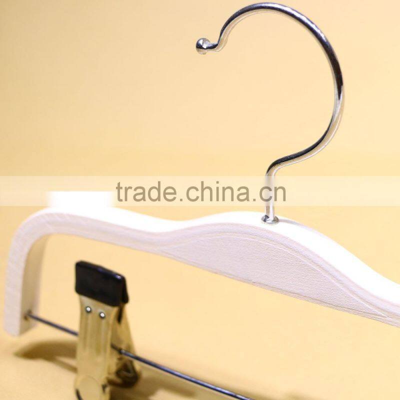 White wooden pants hanger for children garment
