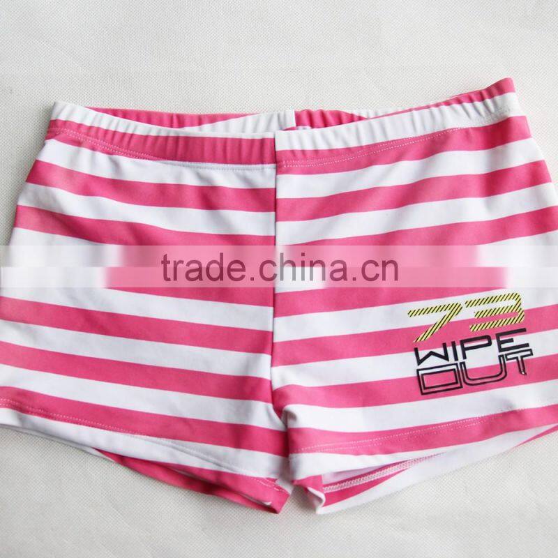 pink and white child swimwear