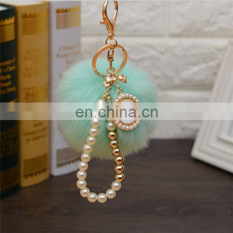 2021 Wholesale custom luxury fur ball key holder Pearl keychains pom pom bow keychain for women bag good quality