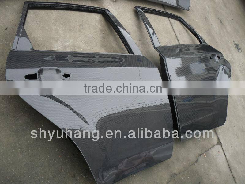 carbon fiber door before and after for GRB STI