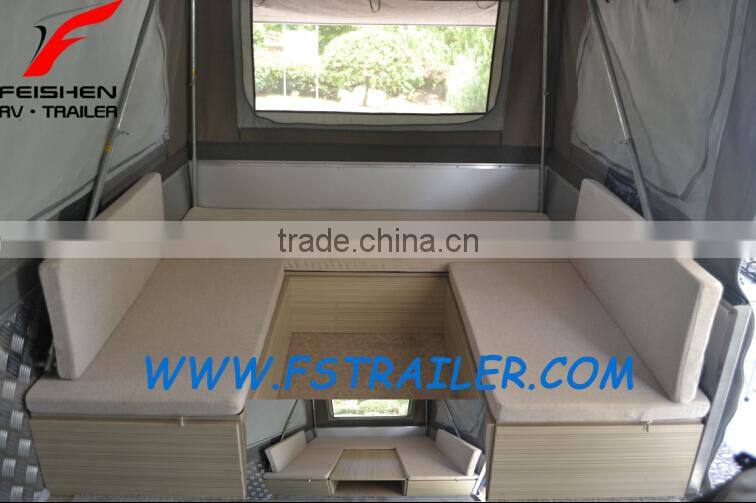 Off-road style foward folding hard floor travel camper trailer with independent suspension and kitchen system