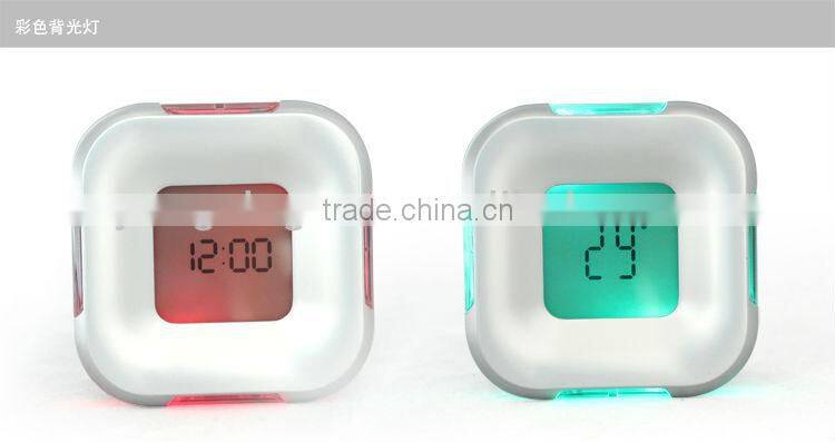 Novelty mini table clock,1 in 4 Digital 4-side Rotation digital alarm clock YF2606