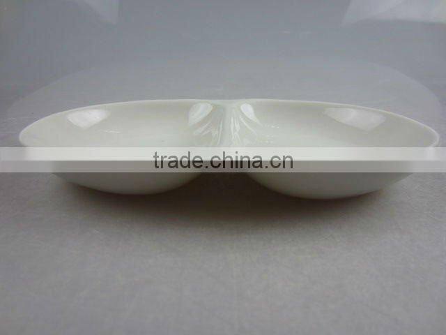 Stock white porcelain two division oval sauce dish