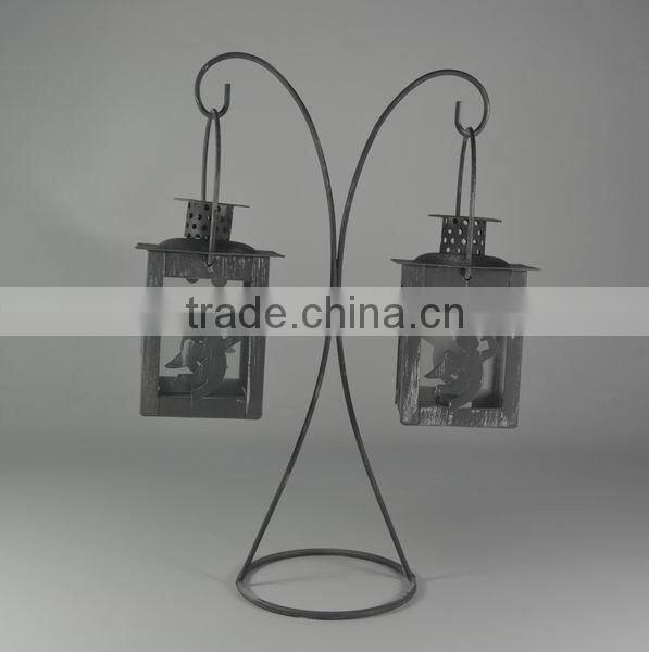 Metal stand with two angel lantern