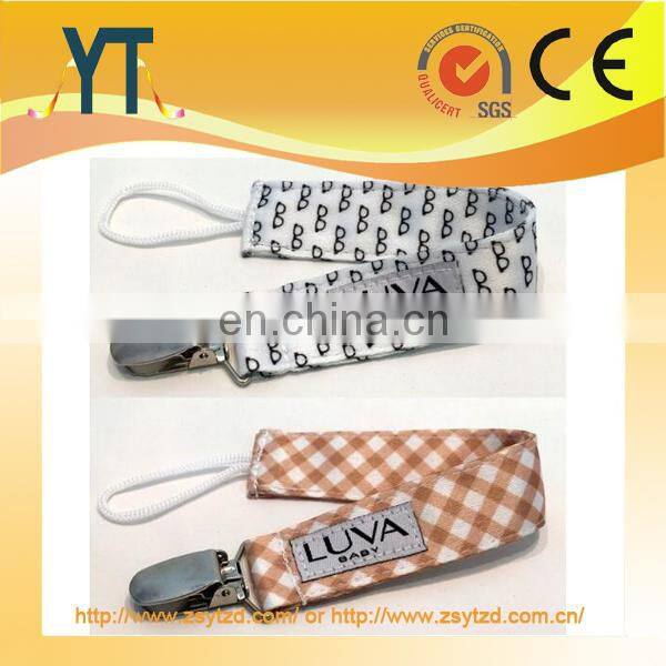 YT Manufacture Glow Skulls Pacifier Clip,100% cotton print ribbon stainless steel metal baby pacifier clip