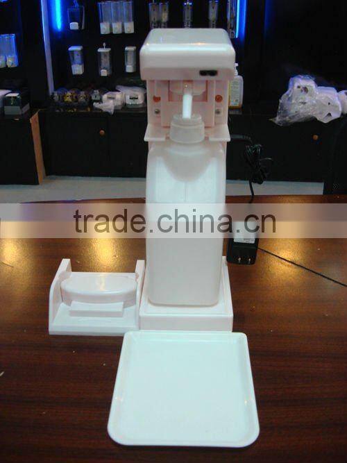 Hand disinfection dispenser