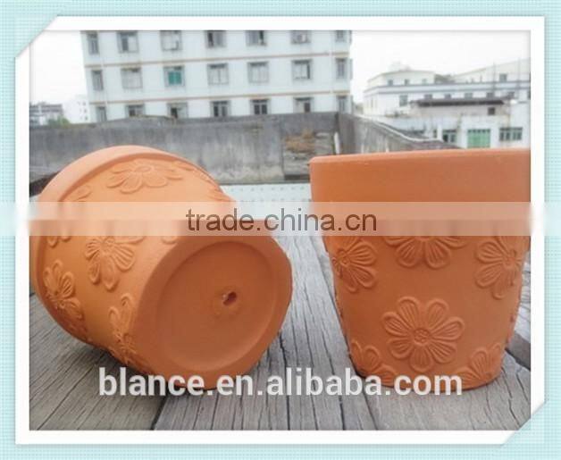 terracotta emboss flower pot with flower emboss