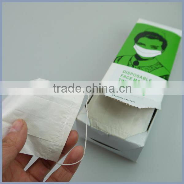 Disposable paper face mask