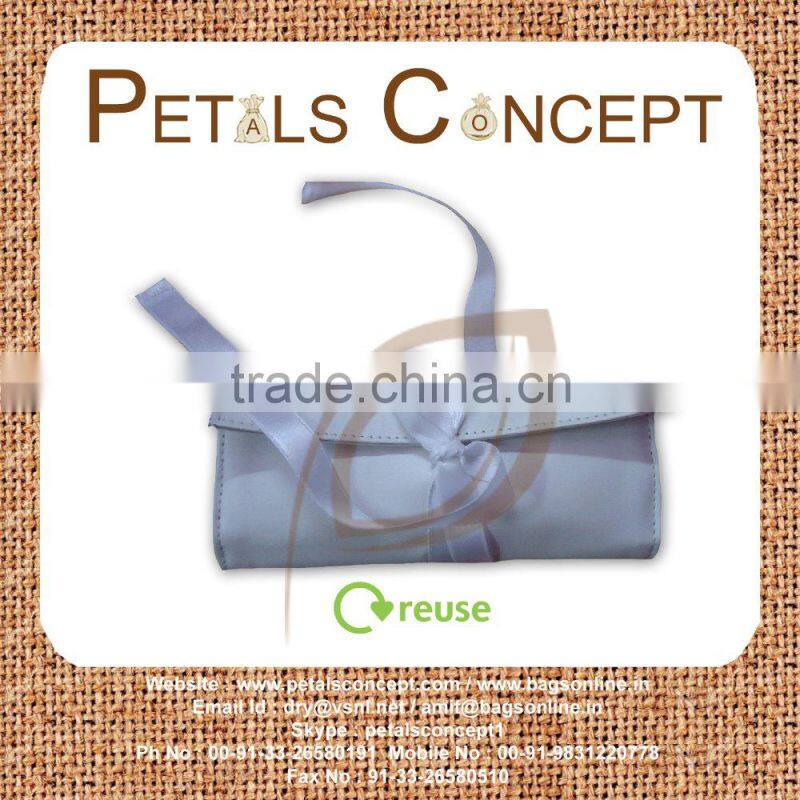 Jewelery folder with polysilk ribbon closure - made from PU - three fold design