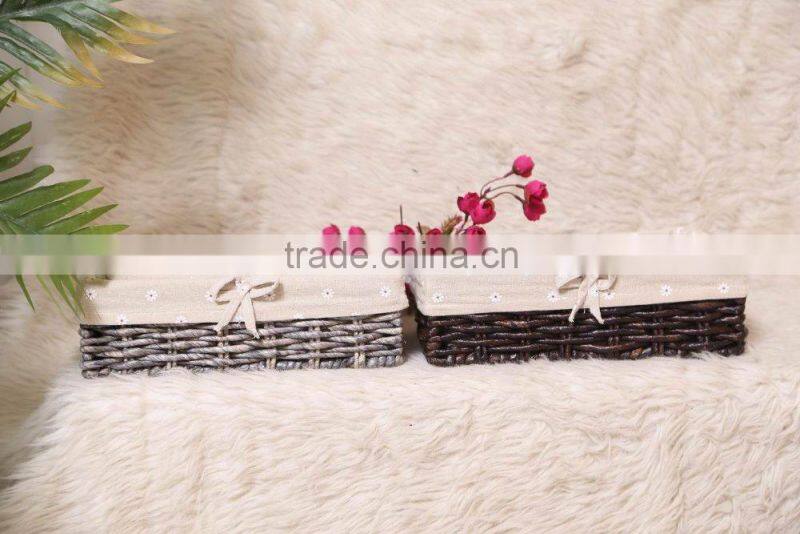 set of 2 maize weaved remote storage baskets