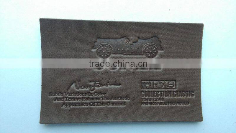 Custom debossed brown branded leather patch