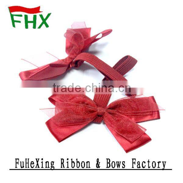 cushions embroidered with curly ribbon