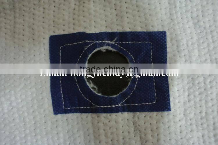 100%recycled cotton floor mop cloth with blue patch and hole in center