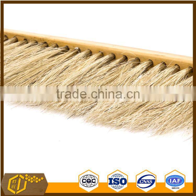 wooden hand beekeeping beehive frame cleaning