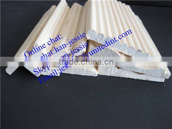 unpainted wood baseboard