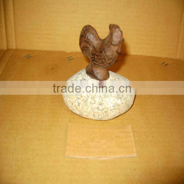 cast iron resign cock crafts with a cobblestone