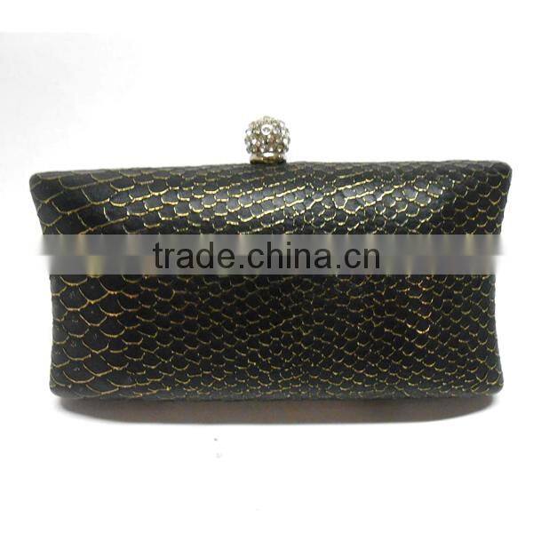 Matching metal frame clutch bag