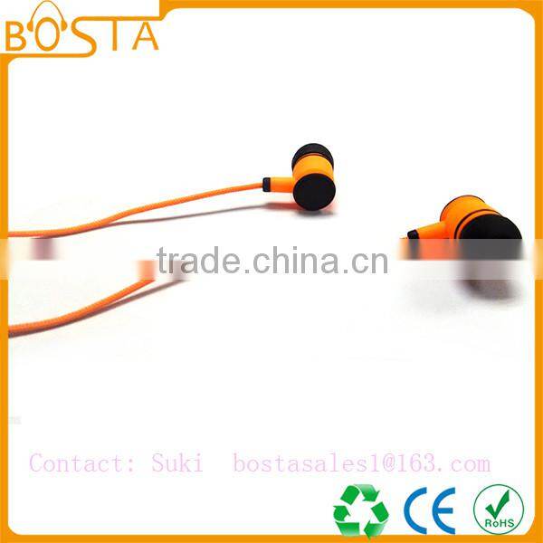 Sports sweat-proof wholesale shiny orange soft ruberized string bluetooth earphones