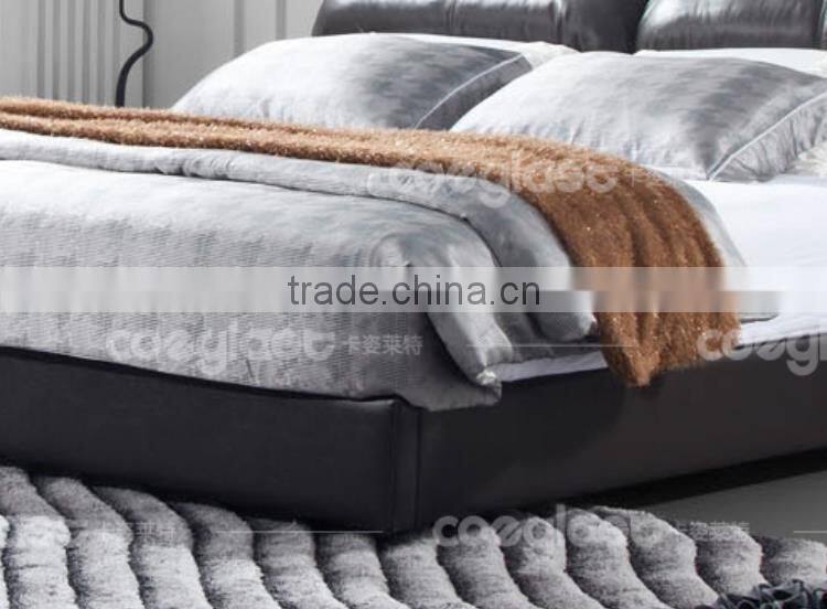 Super comfortable black leather bed