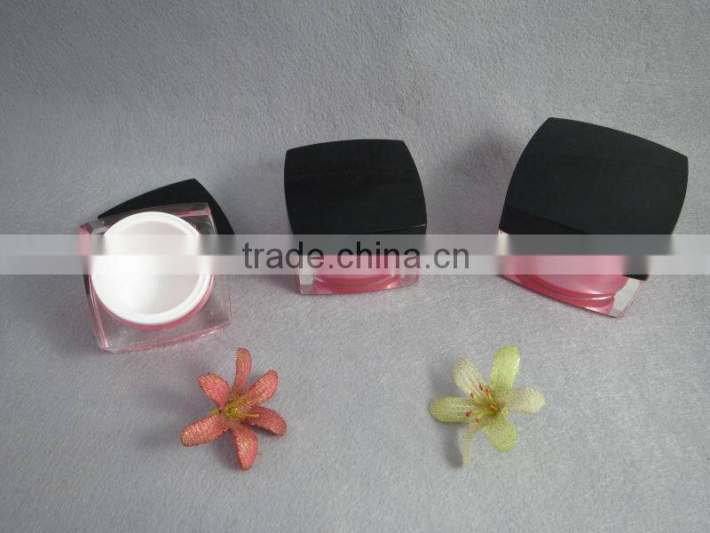 face cream jar with black cap