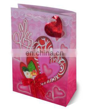 2014Garment package bag with rope handle Cheap white paper bag C1S gift paper bag