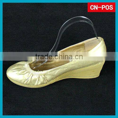 transparent acrylic shoes displayed standing