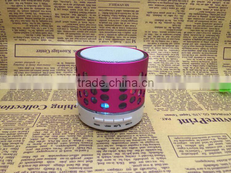 Round hole wireless Small mobile phone bluetooth speakers subwoofer TF card speaker hands-free speaker with LED FM