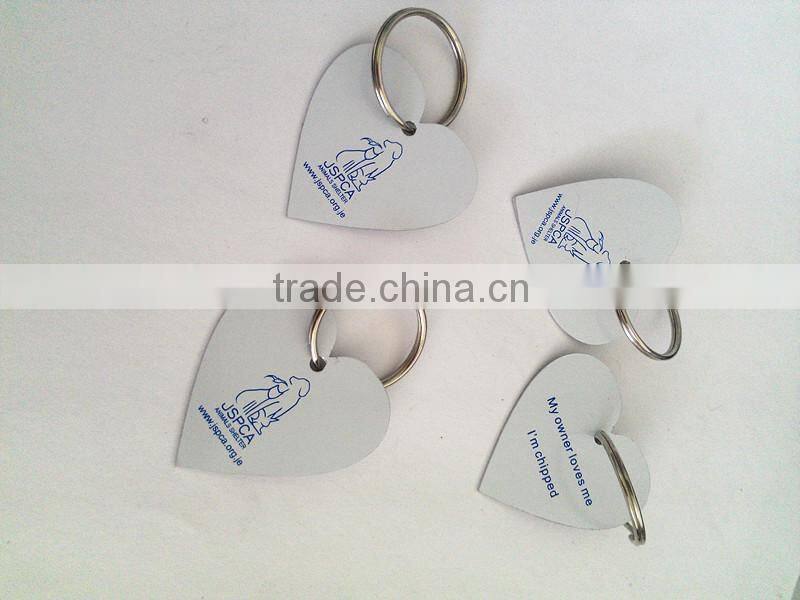 antique black promotional key tag with company logo